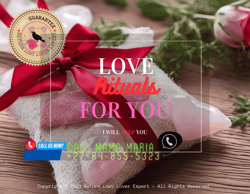 A love sachet filled with herbs and rose quartz, tied with a red ribbon.