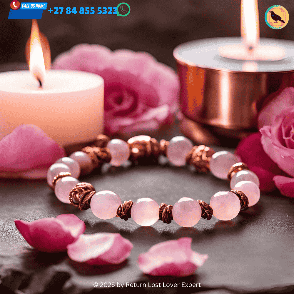 A rose quartz necklace and ring placed on a love altar with candles, ready for a love spell.