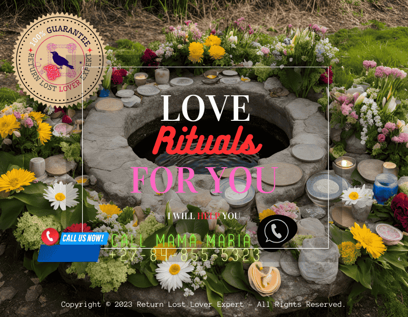 A sacred well surrounded by offerings of flowers and coins used in a Celtic water blessing ritual.